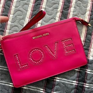Michael Kors Medium Gusset
Leather Love Wristlet in Ultra Pink